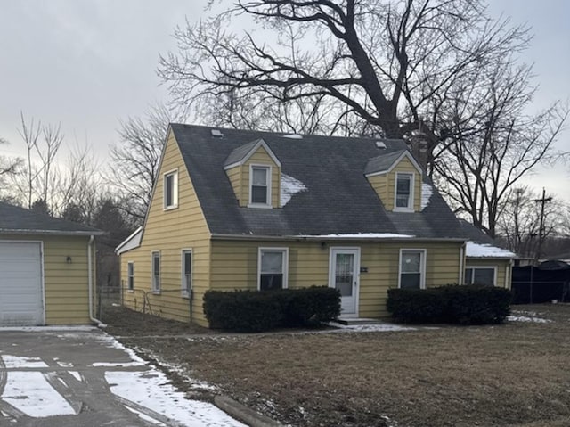 15818 Saint Louis Ave, Markham, IL 60428 - cape cod-style house with driveway, a chimney, and an outdoor structure