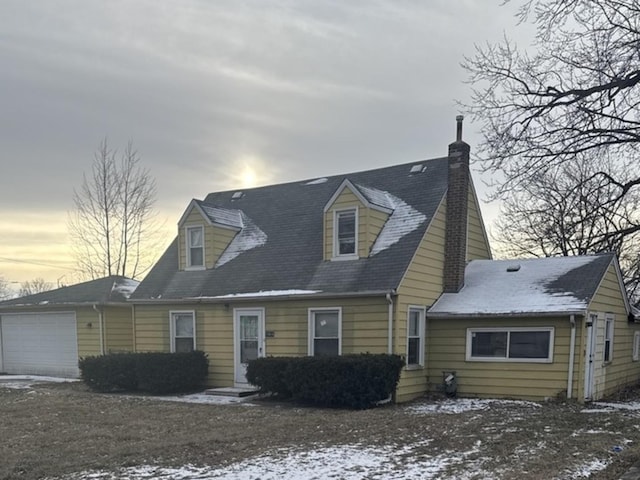 15818 Saint Louis Ave, Markham, IL 60428 - cape cod house with an attached garage and a chimney