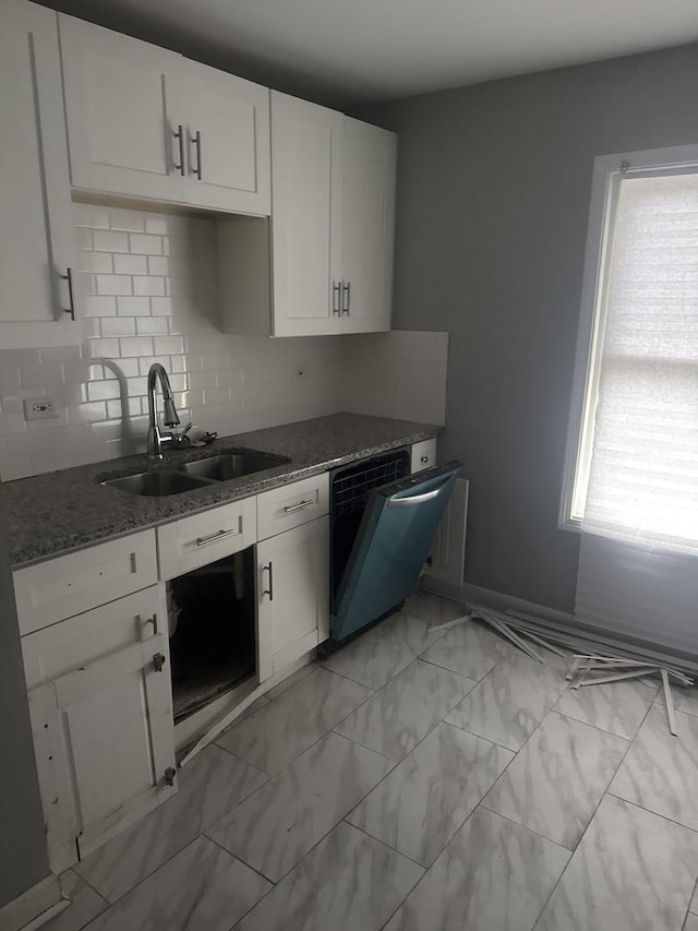 15818 Saint Louis Ave, Markham, IL 60428 - kitchen with dishwashing machine, backsplash, dark stone counters, and white cabinets