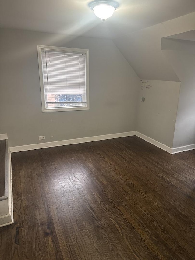 15818 Saint Louis Ave, Markham, IL 60428 - additional living space featuring dark wood finished floors and vaulted ceiling