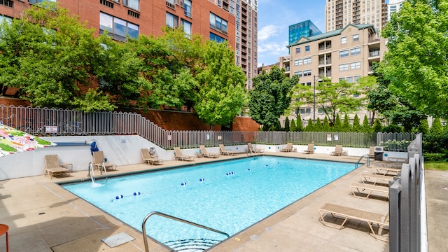 1169 S Plymouth Ct Unit 312, Chicago, IL 60605 - community pool featuring a patio