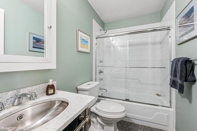 1169 S Plymouth Ct Unit 312, Chicago, IL 60605 - bathroom with a textured ceiling, combined bath / shower with glass door, vanity, and tile patterned flooring