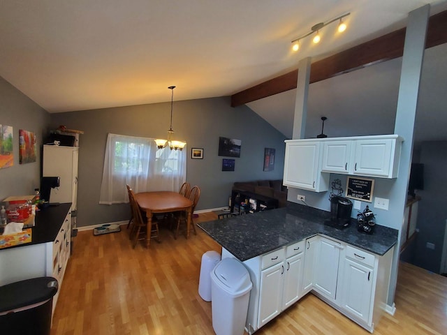 19707 S Skye Dr, Frankfort, IL 60423 - kitchen with light wood-style floors, a peninsula, white cabinetry, a chandelier, and decorative light fixtures