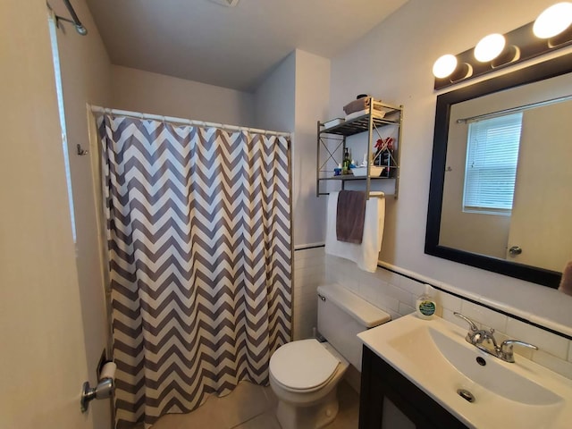 19707 S Skye Dr, Frankfort, IL 60423 - bathroom with vanity, tile walls, a shower with curtain, and a wainscoted wall