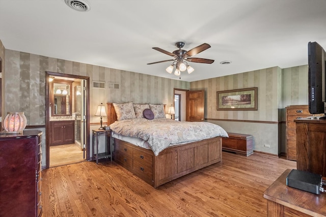 125 Grove Ln, Barrington, IL 60010 - bedroom featuring wallpapered walls, light wood-type flooring, connected bathroom, and a ceiling fan