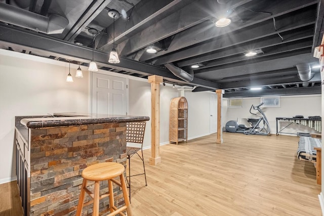 125 Grove Ln, Barrington, IL 60010 - indoor dry bar featuring light wood-type flooring and hanging light fixtures
