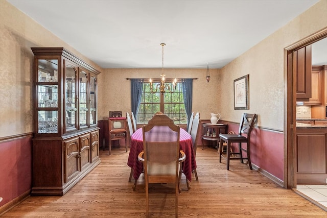 125 Grove Ln, Barrington, IL 60010 - dining space with a chandelier and light wood-style floors