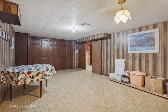 8411 Mansfield Ave, Morton Grove, IL 60053 - living area with light flooring and wooden walls