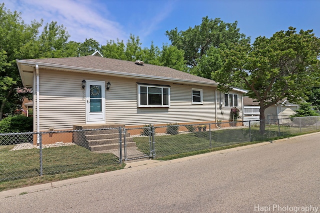 25134 W Lake Shore Dr, Ingleside, IL 60041 - view of front of property featuring a fenced front yard, a shingled roof, and a gate