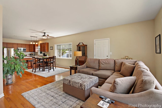 25134 W Lake Shore Dr, Ingleside, IL 60041 - living room featuring ceiling fan and light wood-style flooring