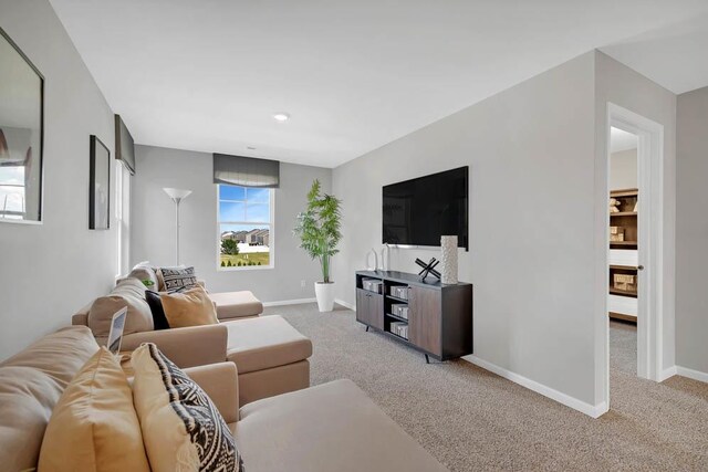 1501 Aspen Ln, Pingree Grove, IL 60140 - carpeted living area featuring baseboards and recessed lighting