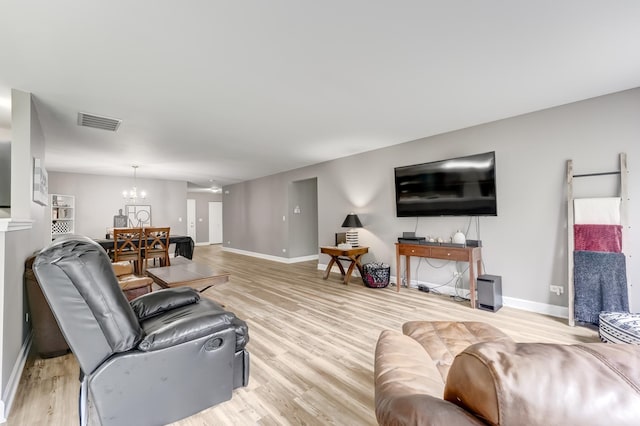 739 Glen Cove Ln, Pingree Grove, IL 60140 - living room with a chandelier and light wood-style floors