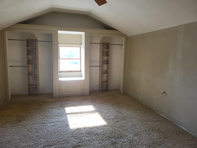 67 S Somonauk Rd, Cortland, IL 60112 - unfurnished bedroom featuring lofted ceiling, multiple closets, and carpet flooring