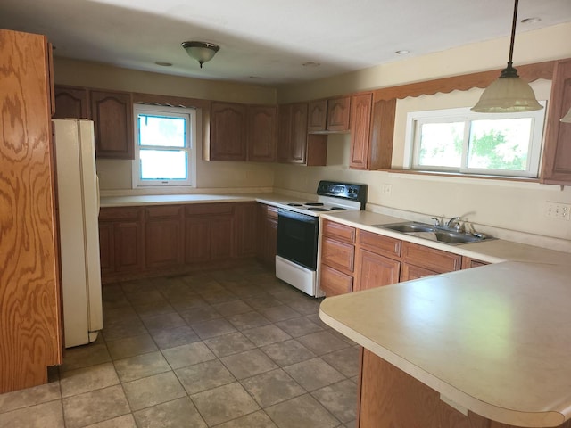 67 S Somonauk Rd, Cortland, IL 60112 - kitchen featuring electric stove, freestanding refrigerator, light countertops, decorative light fixtures, and light tile patterned flooring