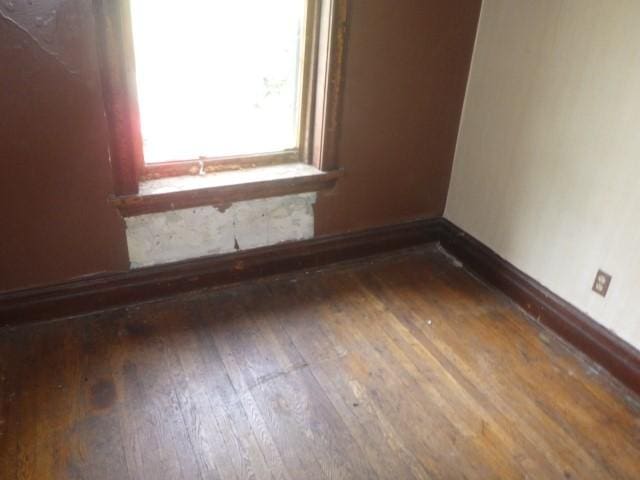 6527 S Marshfield Ave, Chicago, IL 60636 - empty room with wood-type flooring and baseboards