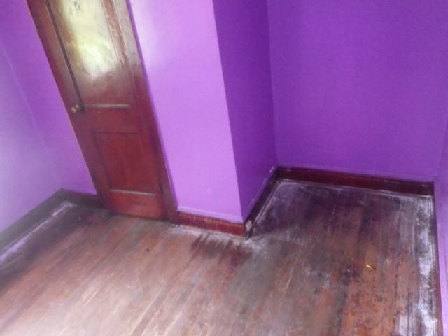 6527 S Marshfield Ave, Chicago, IL 60636 - unfurnished room with wood finished floors and baseboards