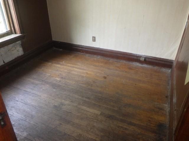 6527 S Marshfield Ave, Chicago, IL 60636 - spare room with dark wood-style flooring and baseboards