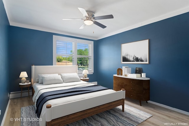 1127 S Old Wilke Rd Unit 201, Arlington Heights, IL 60005 - bedroom featuring a baseboard heating unit, ornamental molding, light wood-style flooring, and a ceiling fan