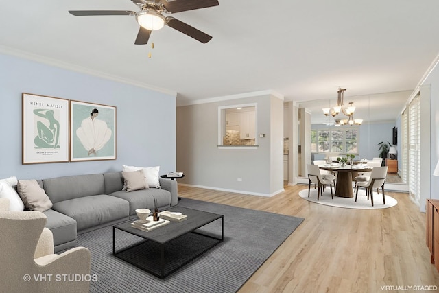 1127 S Old Wilke Rd Unit 201, Arlington Heights, IL 60005 - living room featuring a chandelier, light wood finished floors, ornamental molding, and a ceiling fan