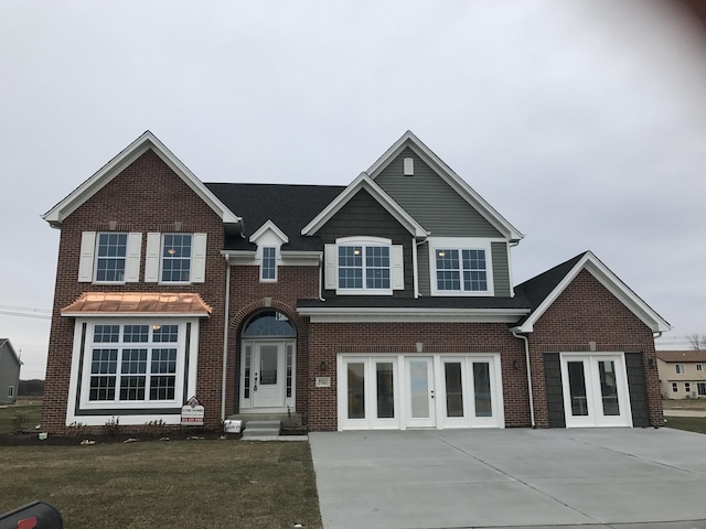 26944 W Old Kerry, Channahon, IL 60410 - traditional-style home featuring french doors, brick siding, entry steps, and a front yard
