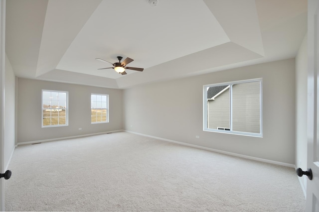 26944 W Old Kerry, Channahon, IL 60410 - carpeted empty room with a raised ceiling and ceiling fan