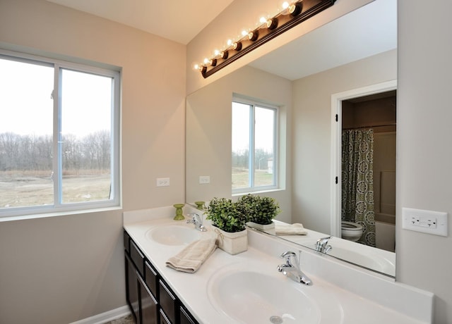 26944 W Old Kerry, Channahon, IL 60410 - bathroom featuring double vanity and shower / tub combo with curtain