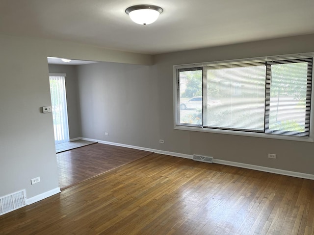 4348 Mann St, Oak Forest, IL 60452 - spare room featuring dark wood finished floors and baseboards