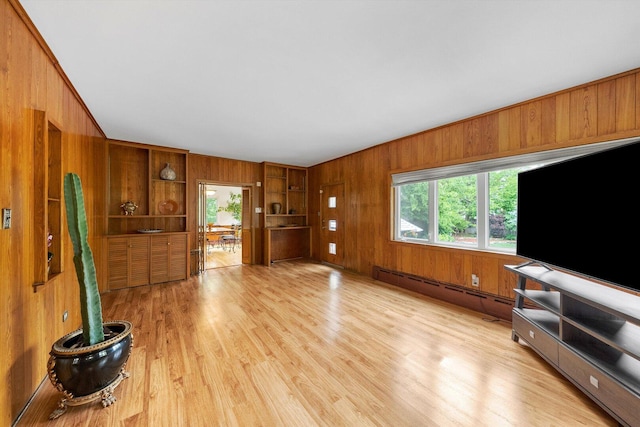 9209 S Hoyne Ave, Chicago, IL 60643 - unfurnished living room featuring wooden walls, light wood-style floors, and baseboard heating