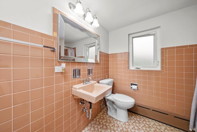 9209 S Hoyne Ave, Chicago, IL 60643 - bathroom with baseboard heating, tile walls, and a wainscoted wall