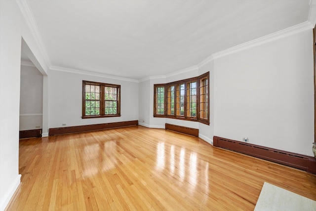 9209 S Hoyne Ave, Chicago, IL 60643 - spare room featuring light wood-type flooring, crown molding, and a baseboard radiator