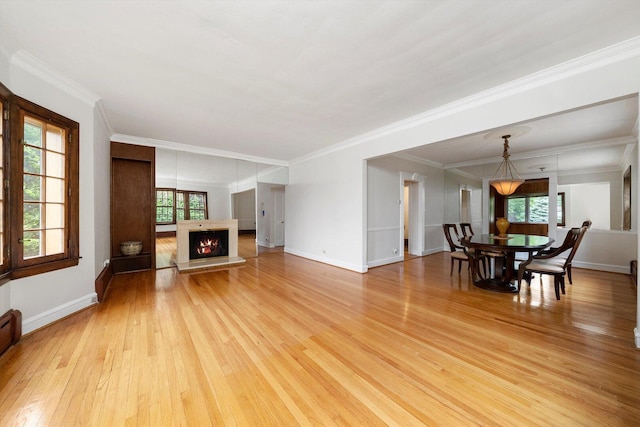 9209 S Hoyne Ave, Chicago, IL 60643 - living area with light wood finished floors, a lit fireplace, plenty of natural light, and crown molding