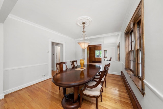 9209 S Hoyne Ave, Chicago, IL 60643 - dining area featuring light wood finished floors and ornamental molding