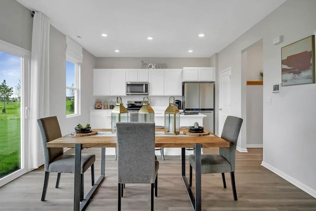 1511 Aspen Ln, Pingree Grove, IL 60140 - dining room featuring light wood-type flooring and recessed lighting