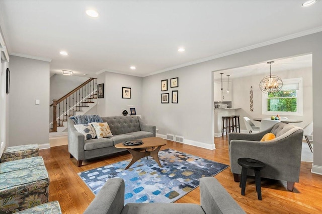 1738 E Jonquil Ter, Arlington Heights, IL 60004 - living area featuring stairs, recessed lighting, a chandelier, light wood-type flooring, and crown molding