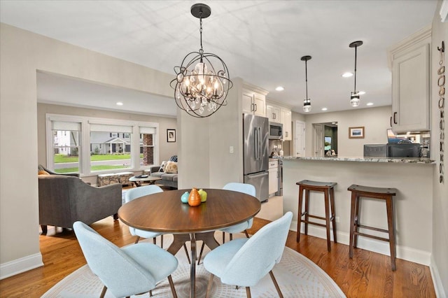 1738 E Jonquil Ter, Arlington Heights, IL 60004 - dining space featuring light wood finished floors, a chandelier, and recessed lighting