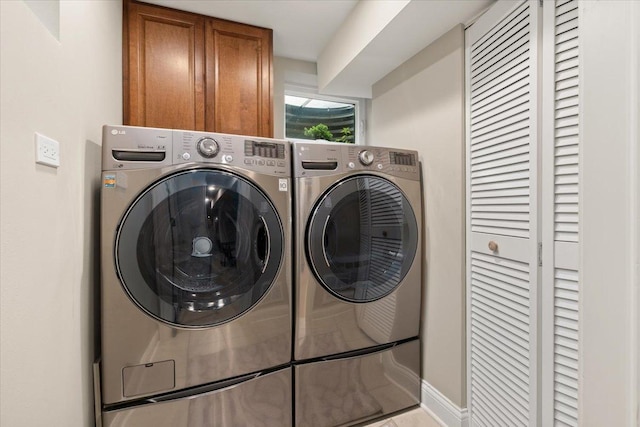 1738 E Jonquil Ter, Arlington Heights, IL 60004 - laundry area featuring cabinet space and washer and dryer