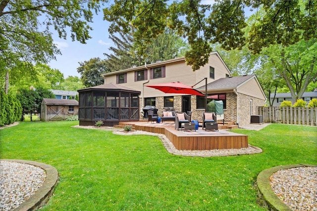 1738 E Jonquil Ter, Arlington Heights, IL 60004 - rear view of property featuring a sunroom, a shed, a deck, an outdoor living space, and brick siding