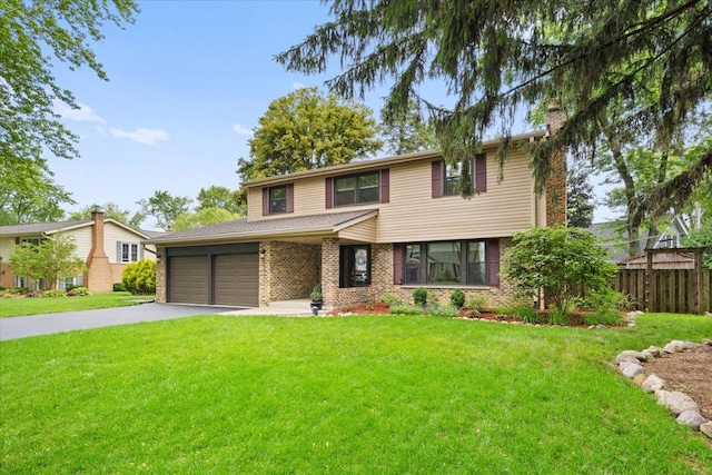 1738 E Jonquil Ter, Arlington Heights, IL 60004 - view of front of property with asphalt driveway, a chimney, brick siding, and an attached garage