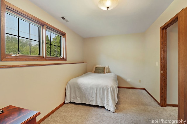 1506 Wilson Ct, Zion, IL 60099 - bedroom featuring light colored carpet and baseboards