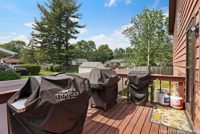 1506 Wilson Ct, Zion, IL 60099 - wooden deck with a fenced backyard and area for grilling