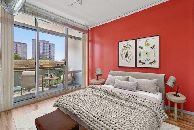 1819 S Michigan Ave Unit 406, Chicago, IL 60616 - bedroom with access to exterior and wood finished floors