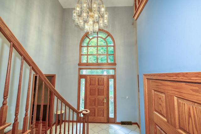 1315 Keim Trl, Saint Charles, IL 60174 - foyer entrance featuring a high ceiling, stairway, and a chandelier