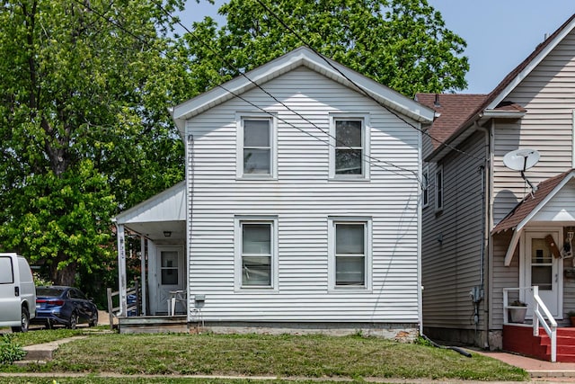520 4th St, Waukegan, IL 60085 - traditional home featuring a front yard
