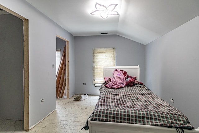 520 4th St, Waukegan, IL 60085 - bedroom featuring lofted ceiling and light wood-type flooring