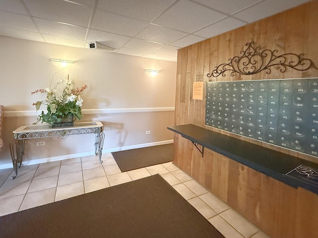 8025 Woodglen Ln Unit 307, Downers Grove, IL 60516 - welcome area featuring mail area, wood walls, and a drop ceiling