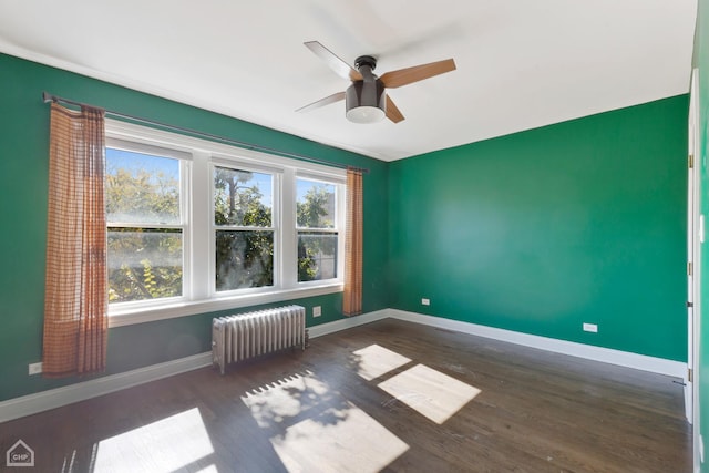 3608 W Dickens Ave Unit 2F, Chicago, IL 60647 - empty room with radiator, ceiling fan, and wood finished floors