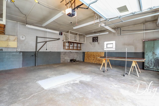 1323 Beverly Dr, Round Lake Beach, IL 60073 - garage with a garage door opener and concrete block wall