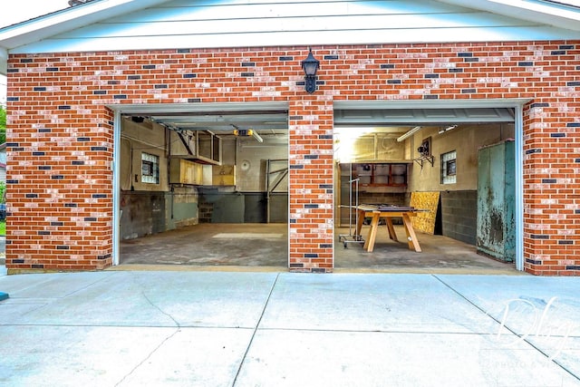 1323 Beverly Dr, Round Lake Beach, IL 60073 - garage featuring driveway