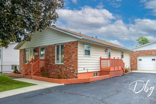 1323 Beverly Dr, Round Lake Beach, IL 60073 - ranch-style house with asphalt driveway, a garage, and brick siding