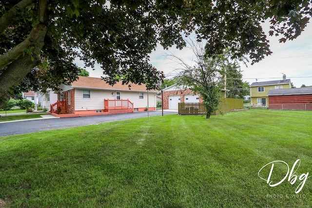 1323 Beverly Dr, Round Lake Beach, IL 60073 - view of yard with a detached garage and an outdoor structure